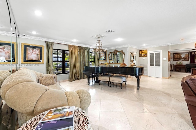 living room featuring ornamental molding and an inviting chandelier