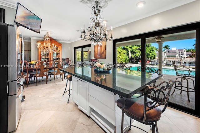 dining room featuring crown molding, french doors, and ceiling fan with notable chandelier