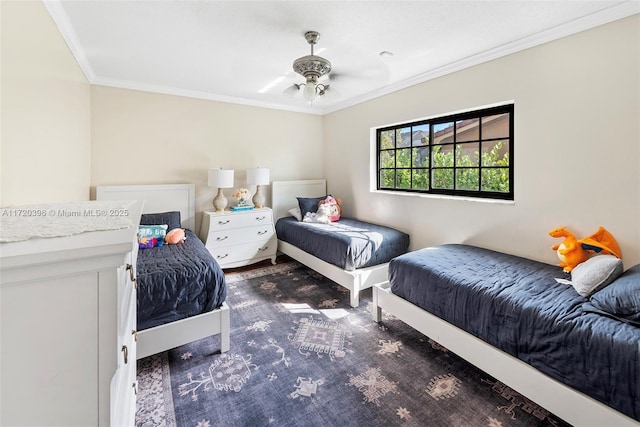 bedroom with ceiling fan and ornamental molding