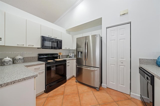 kitchen with white cabinetry, light tile patterned floors, black appliances, and ornamental molding