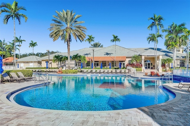 view of swimming pool with a patio area