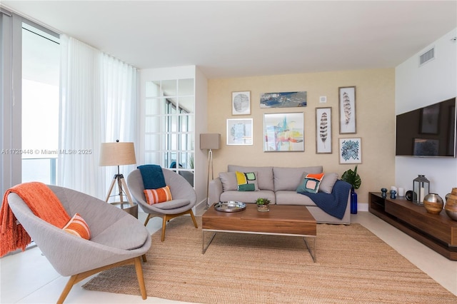 living room featuring plenty of natural light