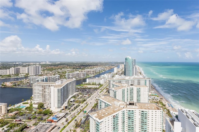 aerial view with a view of the beach and a water view