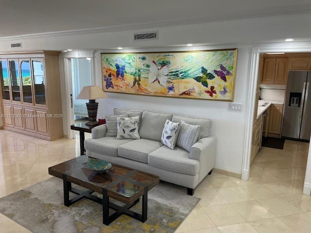 tiled living room with ornamental molding