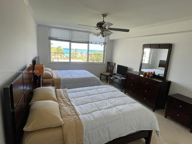 bedroom with ceiling fan and ornamental molding