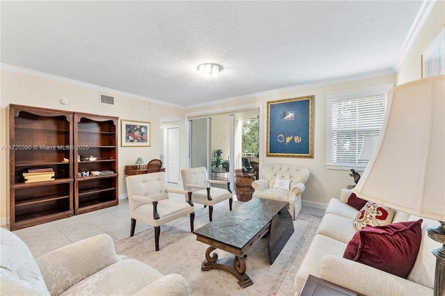 tiled living room with a textured ceiling and ornamental molding