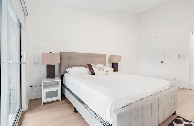 bedroom featuring light wood-type flooring