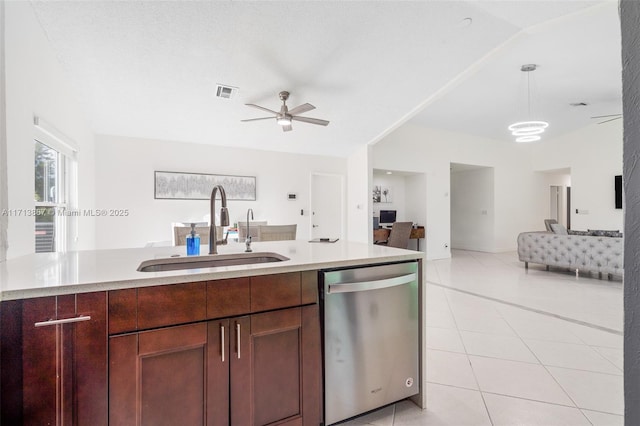 kitchen featuring ceiling fan, dishwasher, sink, decorative light fixtures, and light tile patterned flooring