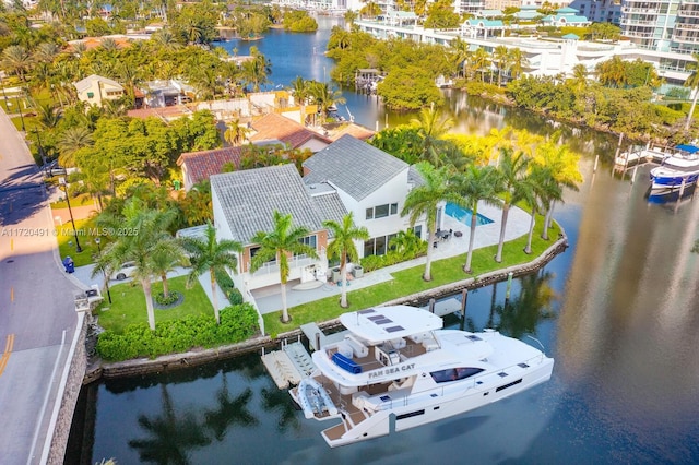 birds eye view of property featuring a water view