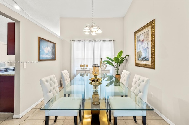 dining room with light tile patterned flooring and an inviting chandelier