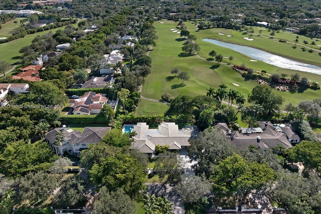 bird's eye view with a residential view, a water view, and golf course view