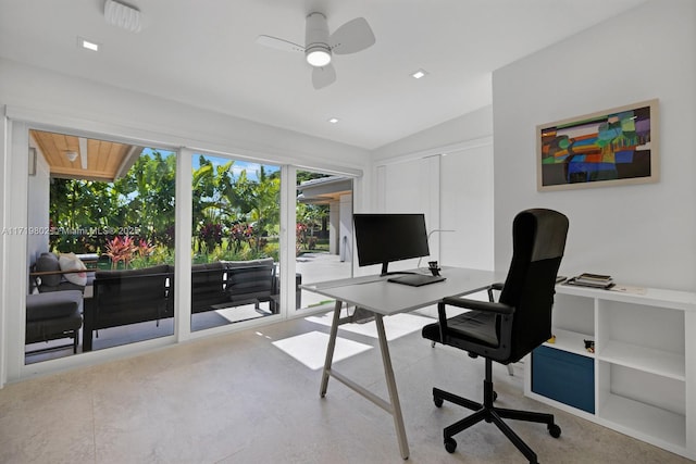 office area featuring vaulted ceiling and ceiling fan