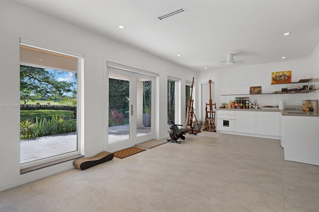 exercise room with ceiling fan, french doors, visible vents, and recessed lighting