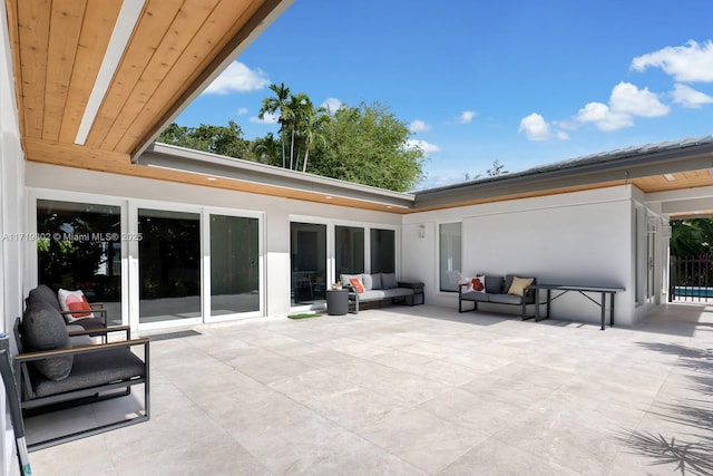 4144 Pinta Ct, Coral Gables, FL 33146 - view of patio with outdoor lounge area