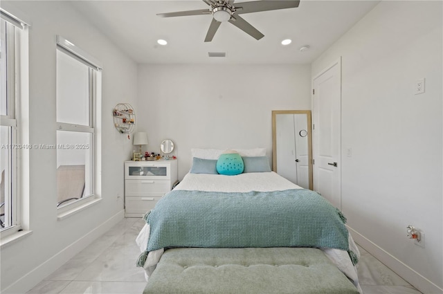 bedroom featuring ceiling fan