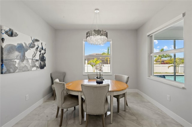 dining room featuring a chandelier