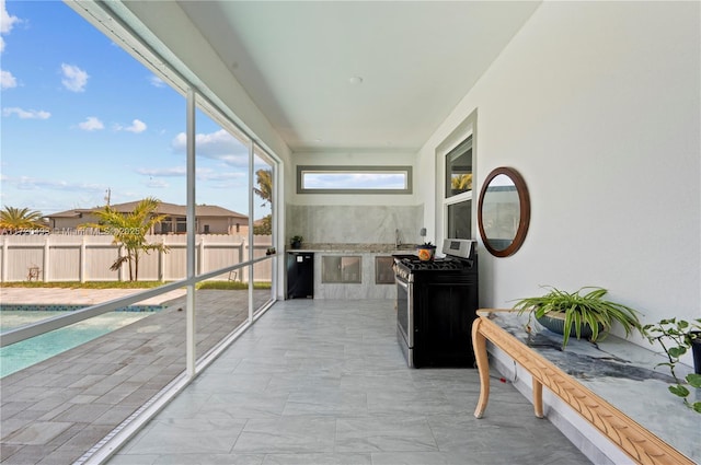 sunroom with sink