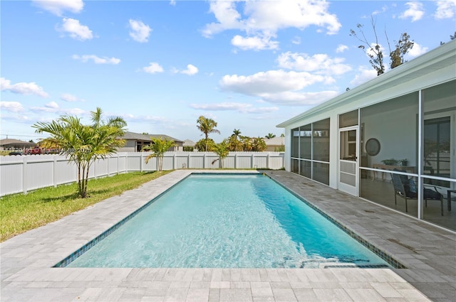 view of pool with a sunroom