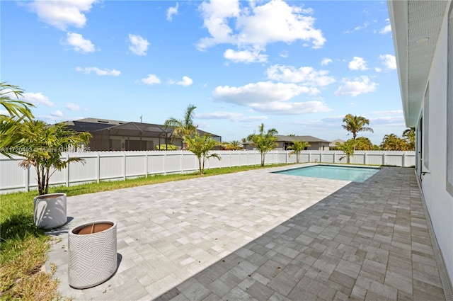 view of pool featuring a patio