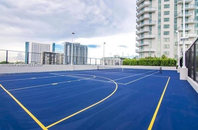 view of basketball court with tennis court