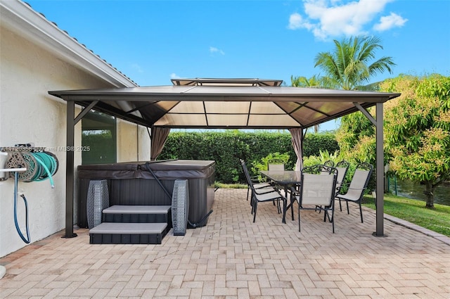 view of patio with a gazebo and a hot tub