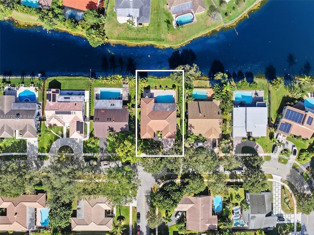 drone / aerial view with a water view