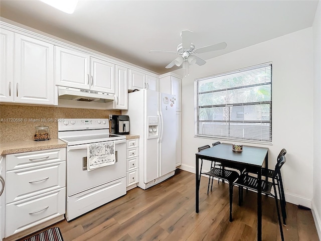 kitchen featuring white appliances, dark hardwood / wood-style floors, white cabinetry, and ceiling fan