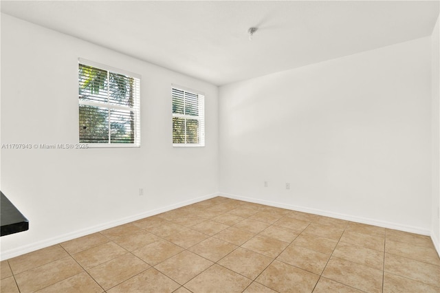 view of tiled spare room