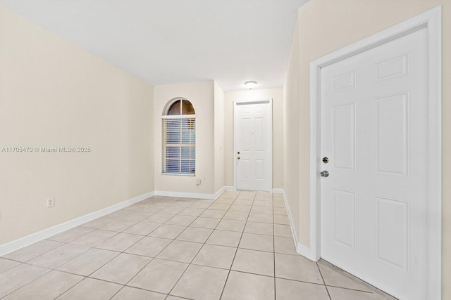 foyer entrance featuring light tile patterned floors