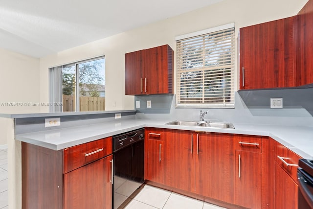 kitchen with dishwasher, stove, light tile patterned flooring, and sink