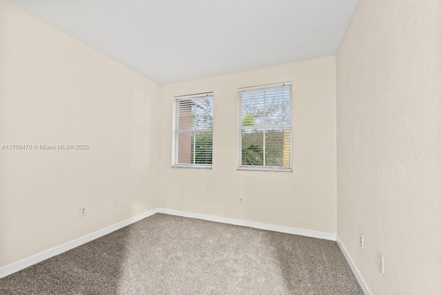 view of carpeted spare room