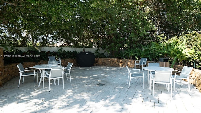 view of patio with outdoor dining area