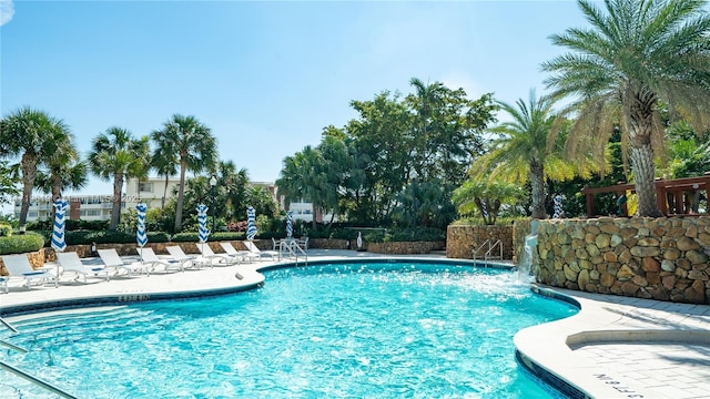 pool with a patio