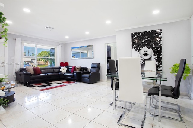 living room with light tile patterned floors and crown molding