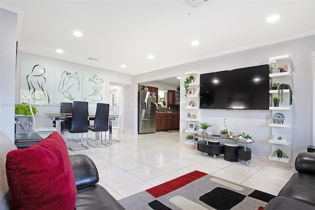 living room with light tile patterned floors