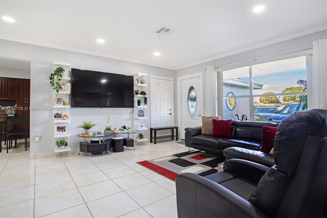 tiled living room featuring crown molding