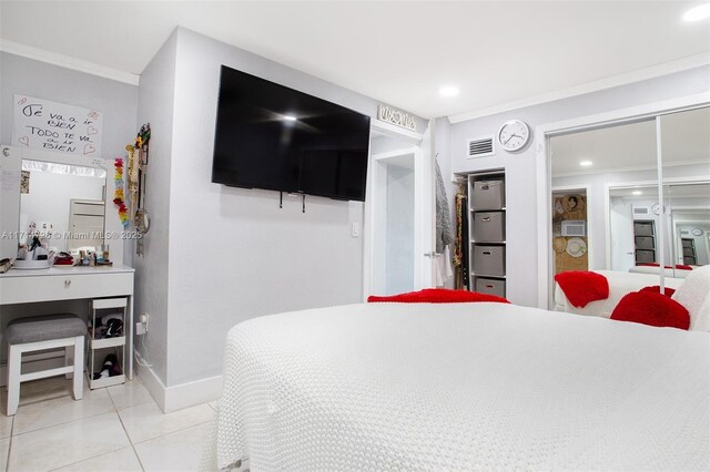 tiled bedroom with ornamental molding