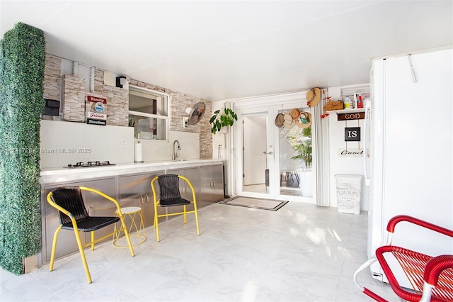 kitchen featuring sink and french doors