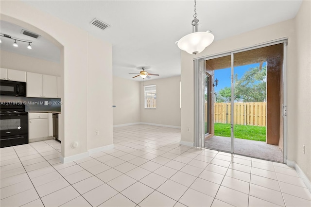 kitchen featuring stove, ceiling fan, pendant lighting, dishwasher, and white cabinetry