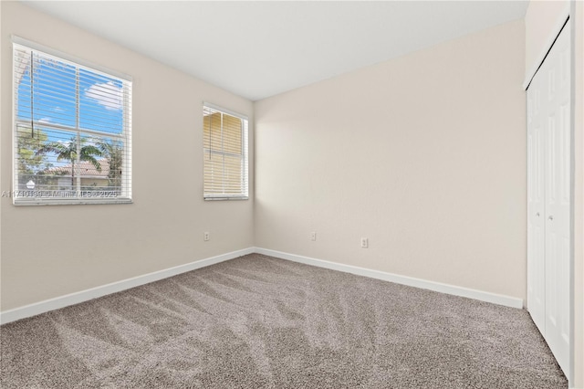 unfurnished bedroom featuring carpet floors