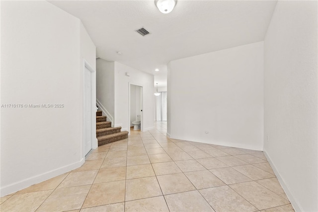 view of tiled spare room