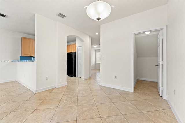 view of tiled spare room