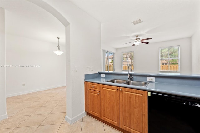 kitchen with dishwasher, hanging light fixtures, sink, ceiling fan, and light tile patterned flooring