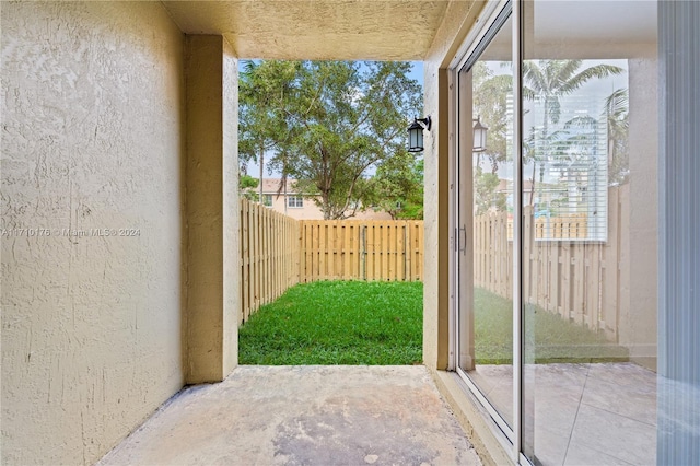 doorway to outside featuring a healthy amount of sunlight