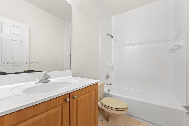 full bathroom with toilet, vanity, tile patterned floors, and shower / bathtub combination