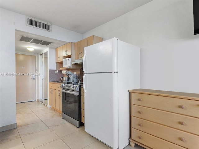 kitchen featuring backsplash, light brown cabinetry, light tile patterned floors, and white appliances