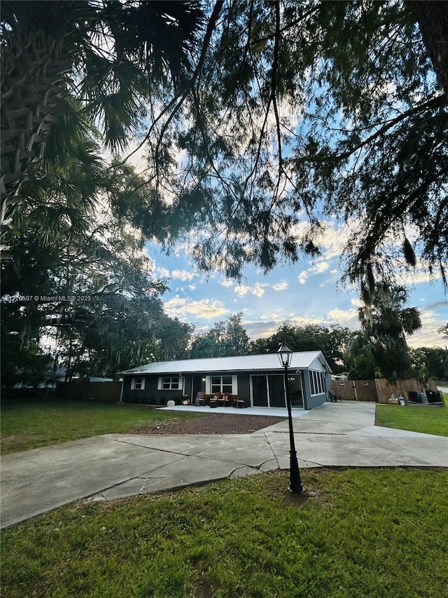 view of community featuring a lawn