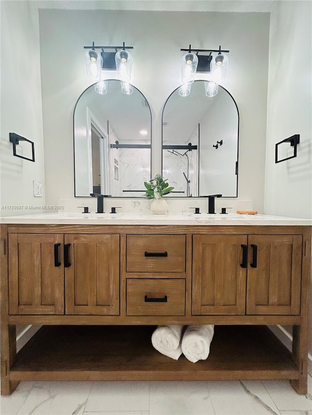 bathroom with tile patterned flooring, vanity, and a shower with shower door