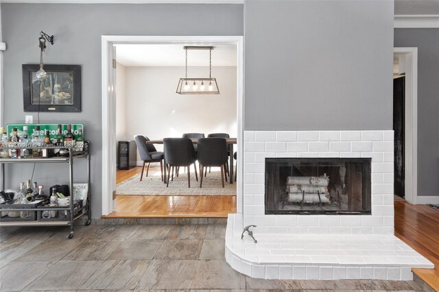 living room featuring a fireplace