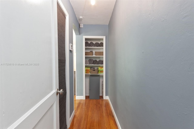 corridor featuring light wood-type flooring